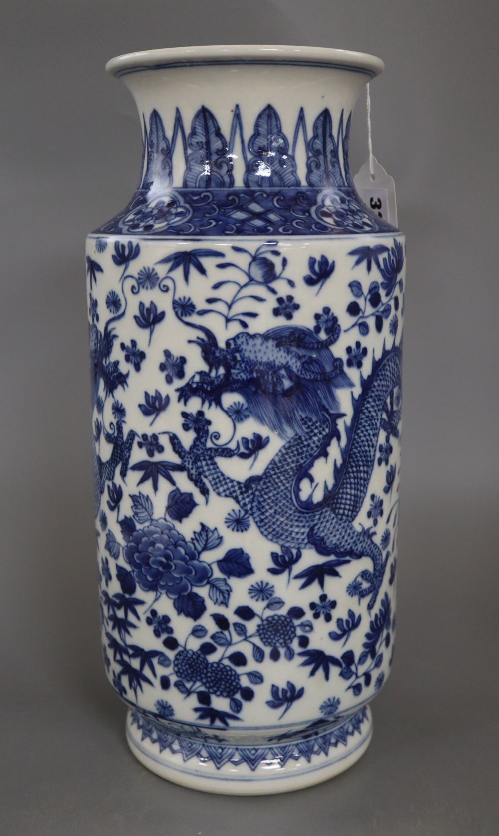 A large Chinese blue and white cylindrical dragon vase, with Kangxi mark, height 37cm